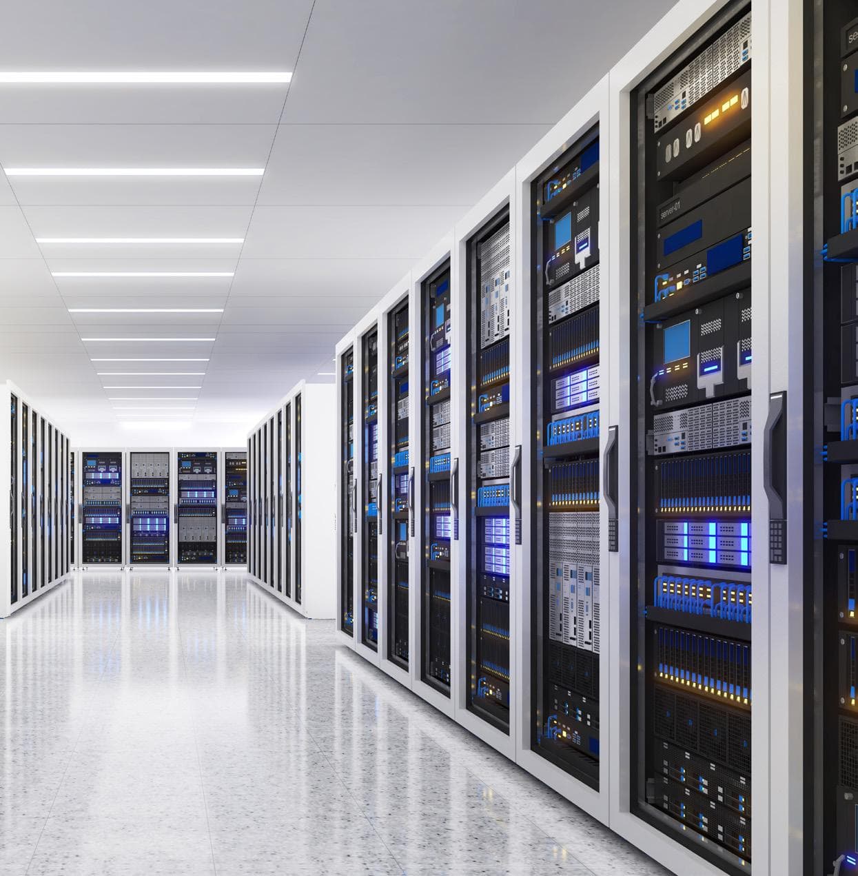 Data centre server room with equipment racks and integrated ceiling system supporting airflow and cooling efficiency