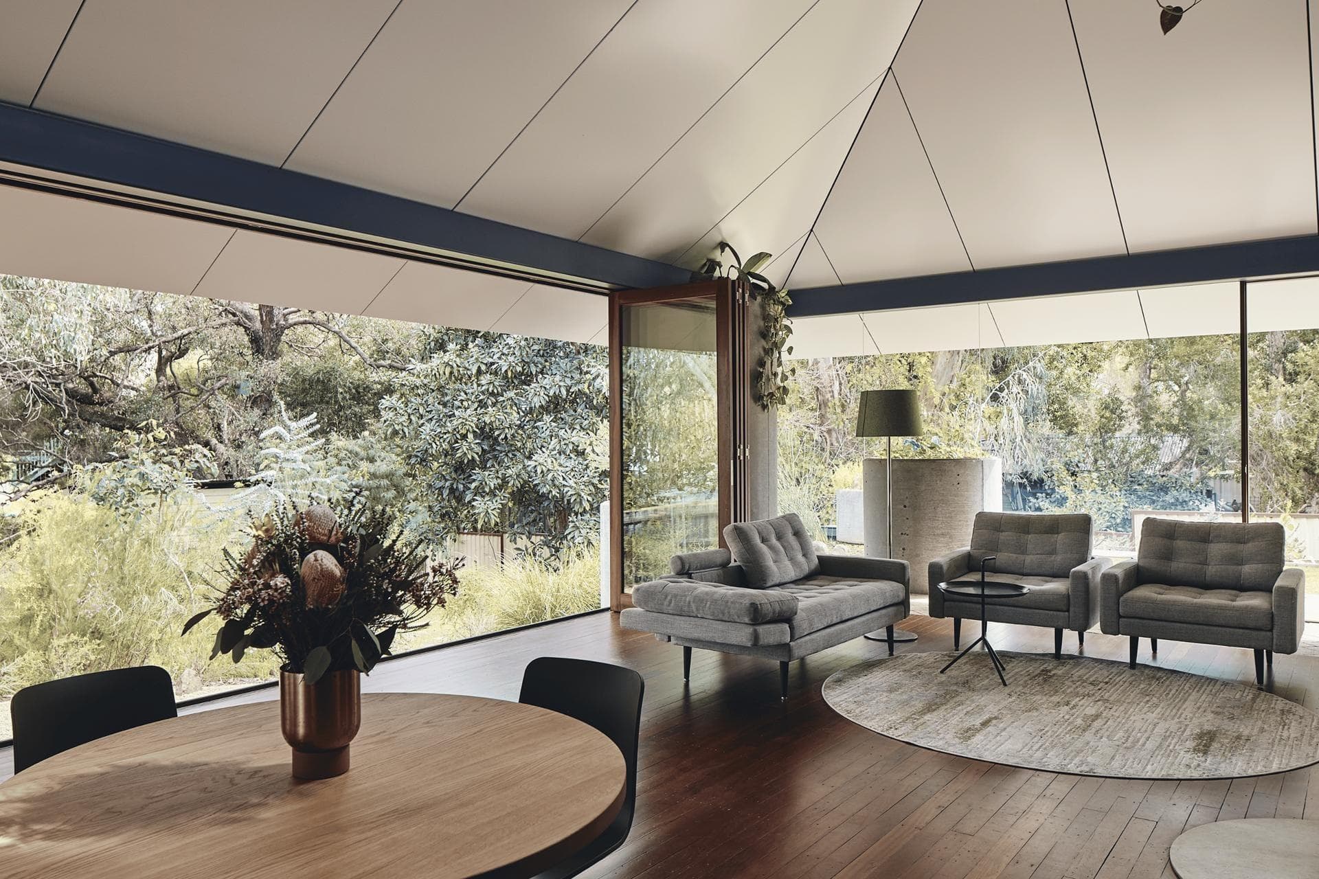 Interior living space with ALPOLIC™/fr ceiling panels, hanging plants and operable roof lights