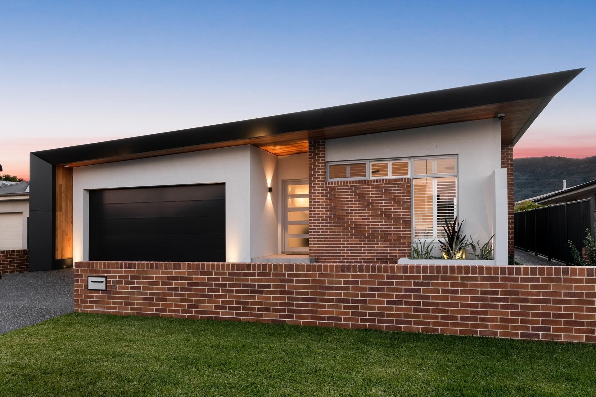 Angled view highlighting ALPOLIC™/fr cladding defining strong roofline and façade geometry