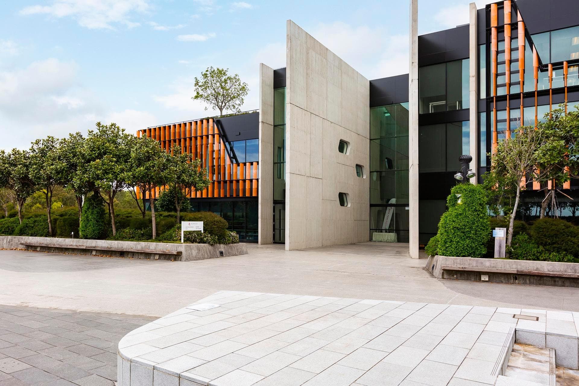 Architectural detail showing ALPOLIC™ NC/A1 panels in Black and Mandarin Orange