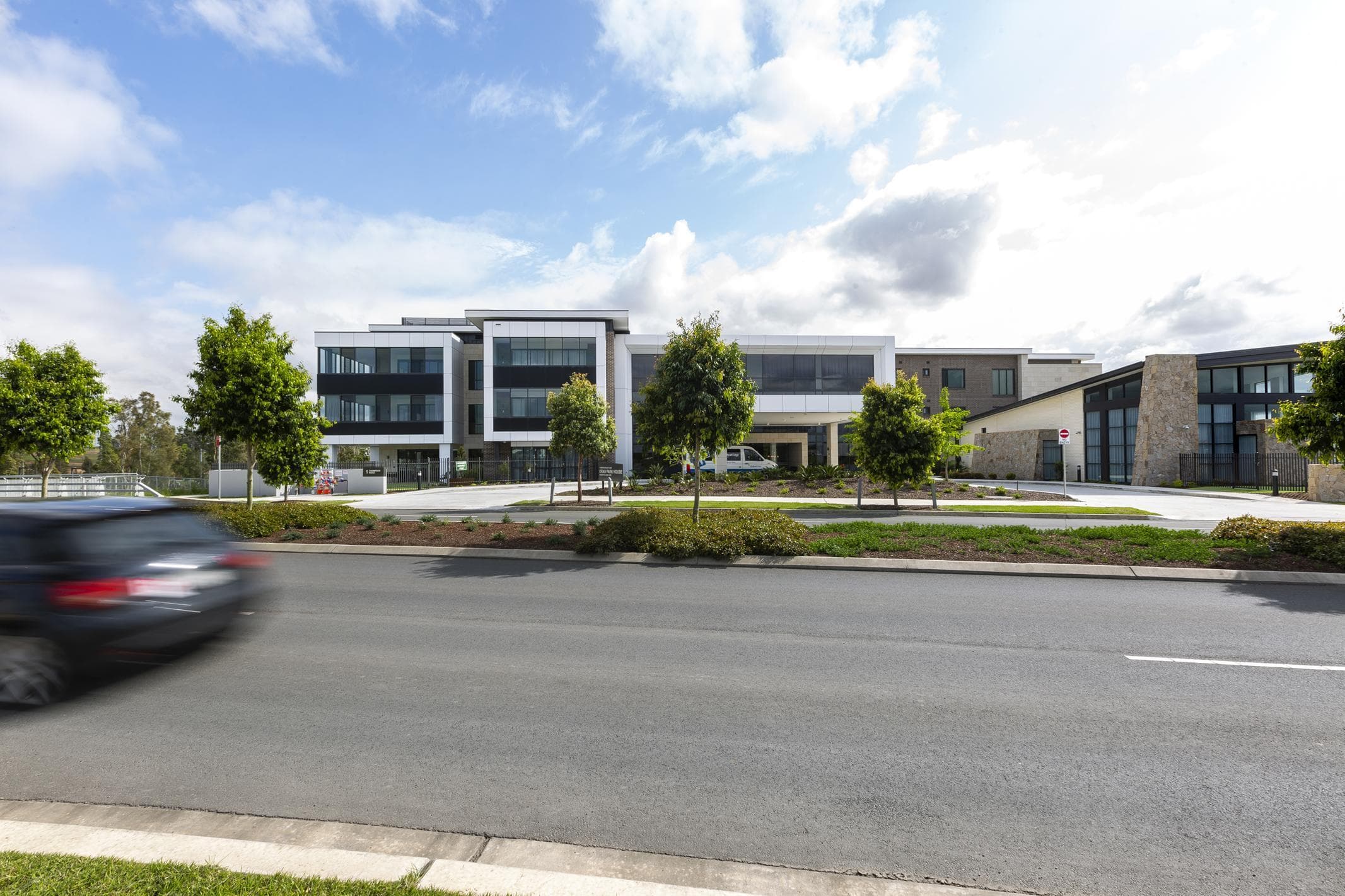 Street view of Oran Park House with ALPOLIC™ NC/A1 cladding framing windows and upper façade elements