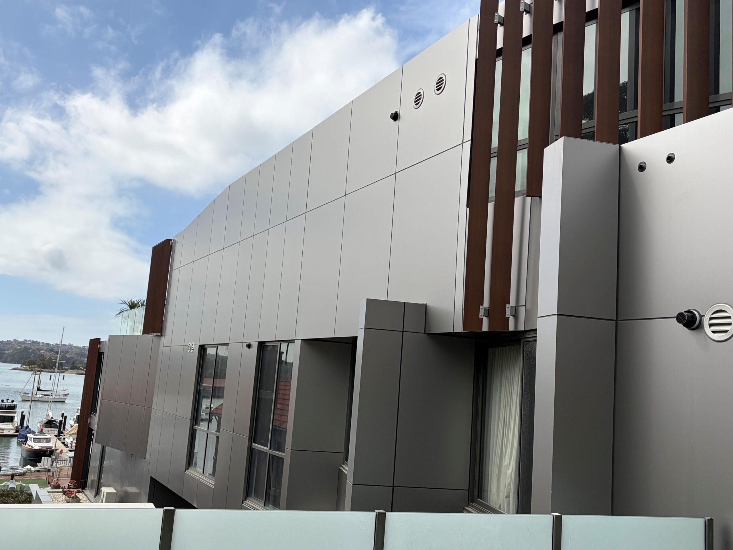 ALPOLIC™ NC/A1 Dark Grey Metallic façade cladding on Breeze Apartments overlooking the Drummoyne waterfront