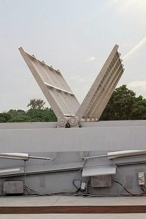 Close-up of motorised anodised aluminium butterfly panel within durlum daylight control system