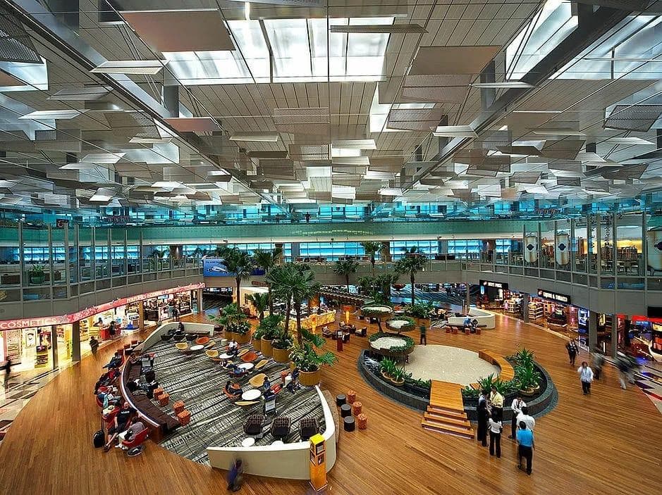 Passenger retail and lounge area beneath durlum ceiling and lighting system at Changi Airport Terminal 3