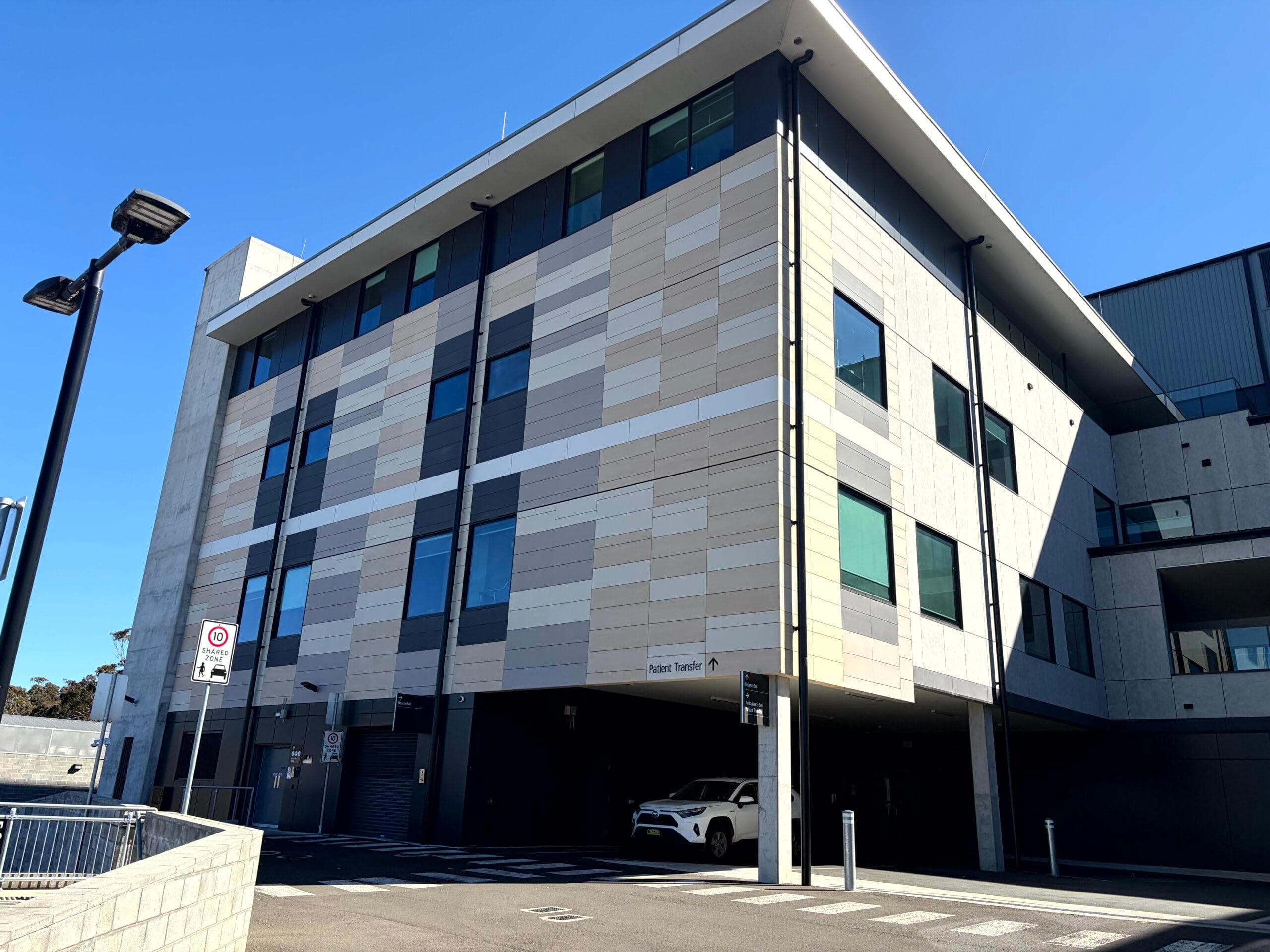 Side elevation of Goulburn Base Hospital showing ALPOLIC™ NC/A1 recladding integrated with the healthcare façade