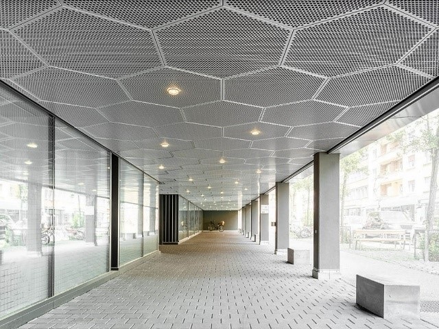 durlum bespoke perforated metal ceiling in hexagonal shapes