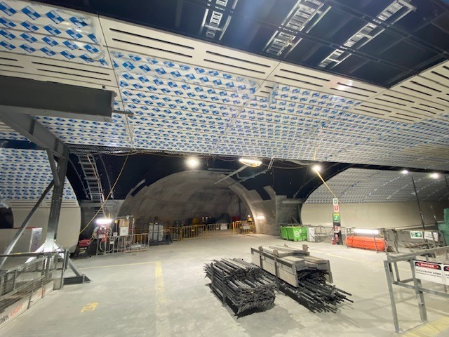 durlum bespoke Metal Ceiling lines the cavern of Victoria Cross Metro Station