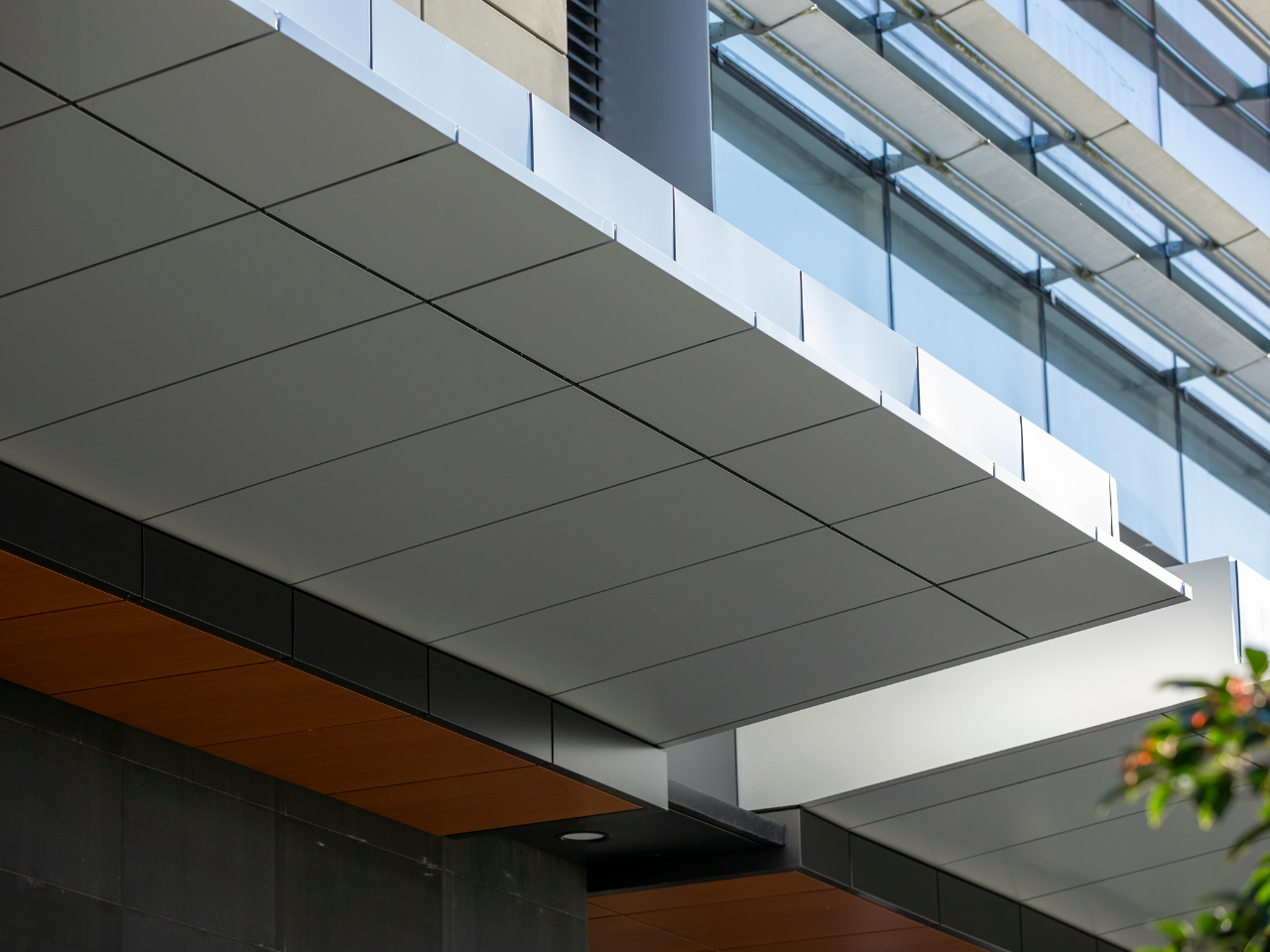 Modern façade of Charles Perkins Centre in NSW, showcasing sustainable architectural cladding.
