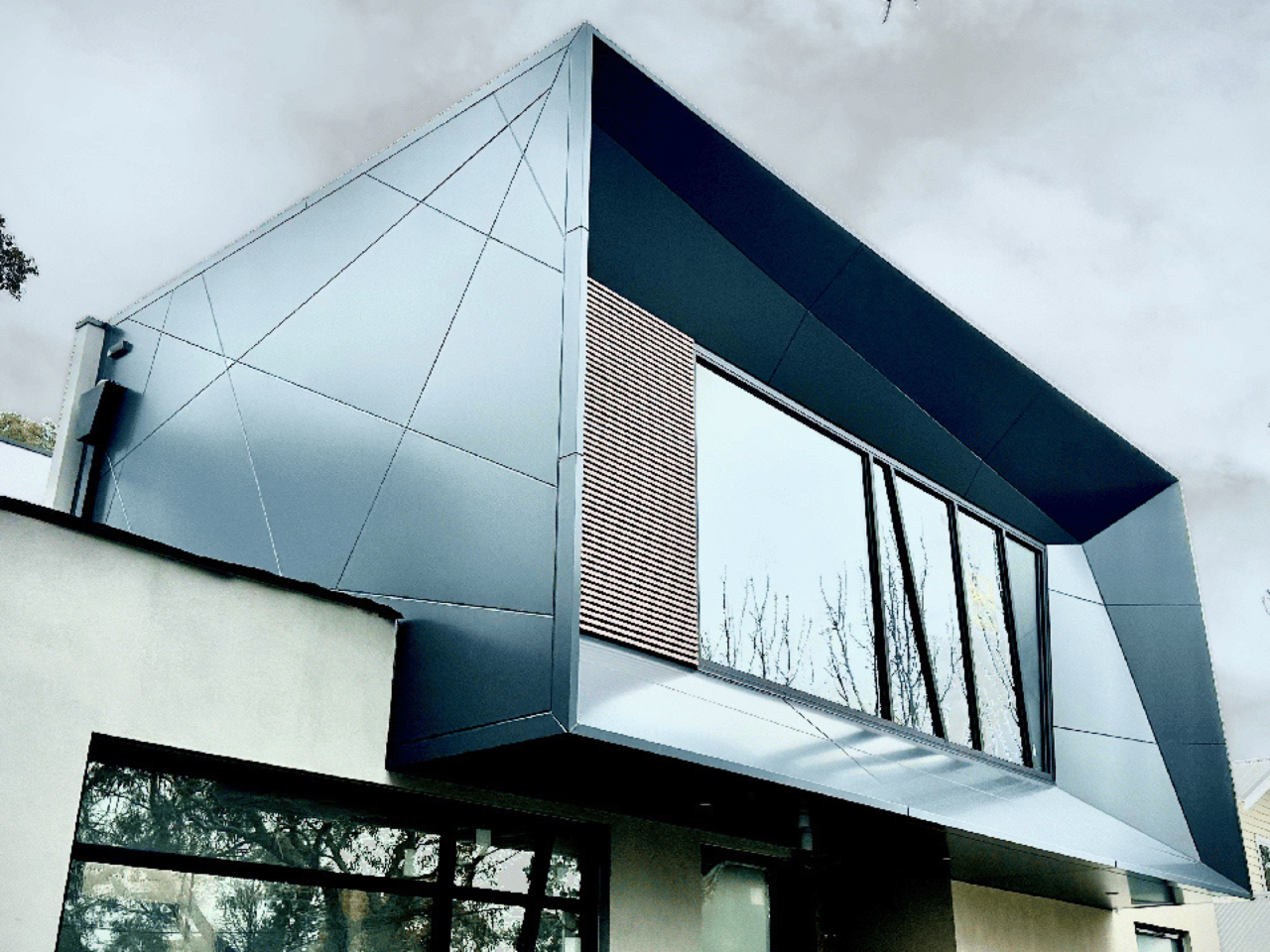 Residential façade detail on Lake Road, Blackburn featuring aluminium cladding.