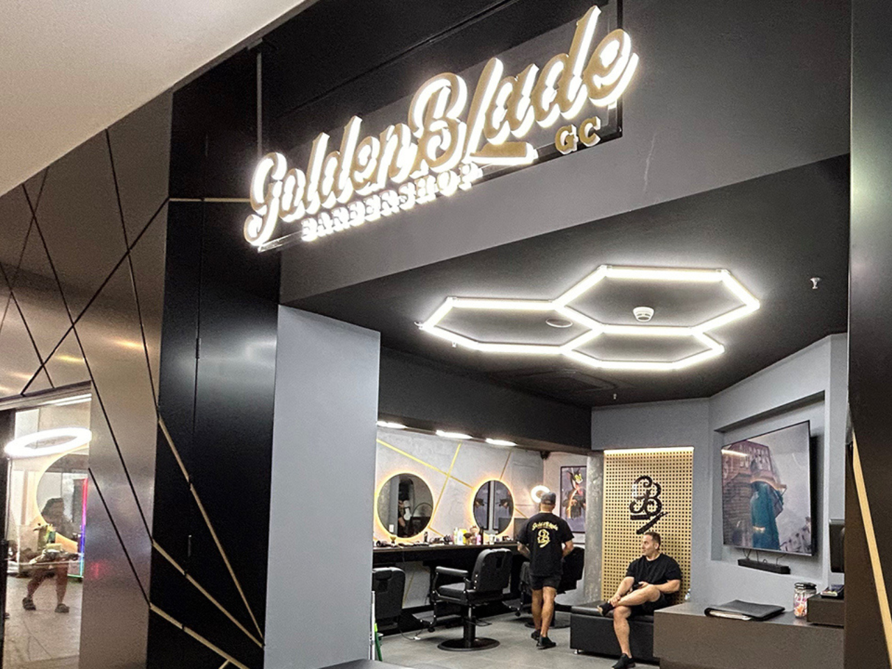 Distinctive Golden Blade Barbershop façade in Queensland clad with DtS non-combustible aluminium panels.