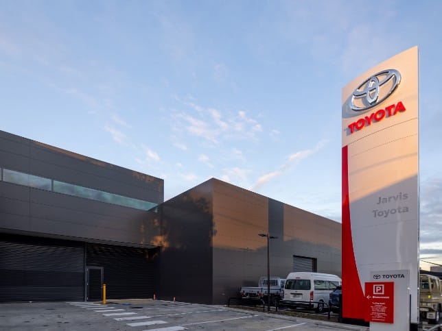 Jarvis Toyota building with dark ALPOLIC™ façade cladding and prominent Toyota pylon signage